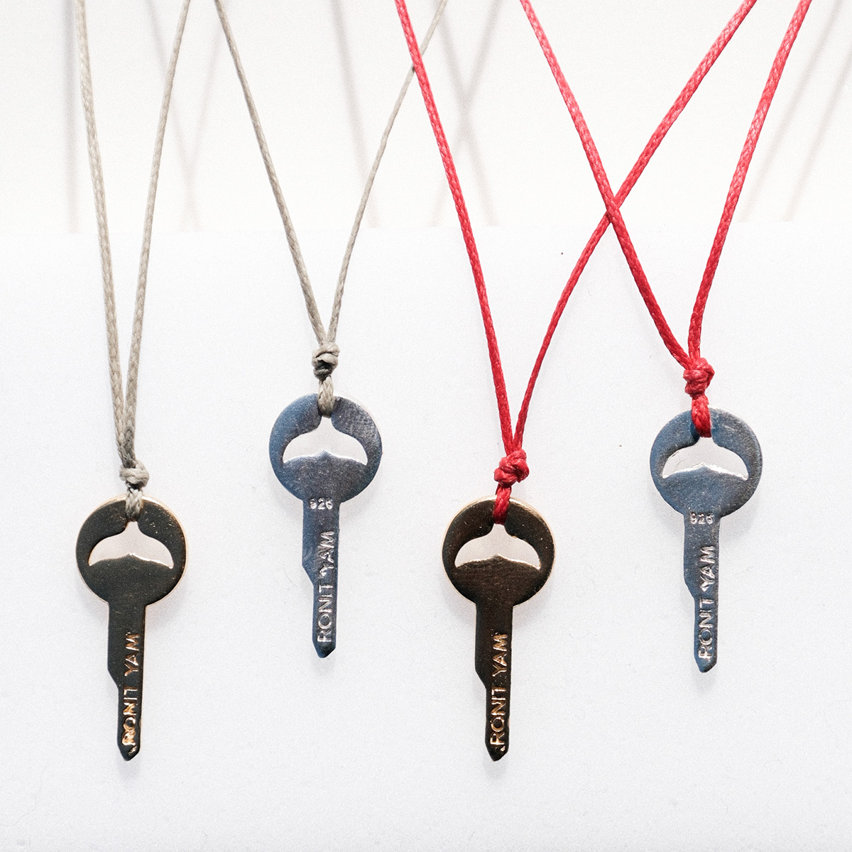 Whale key strand necklace