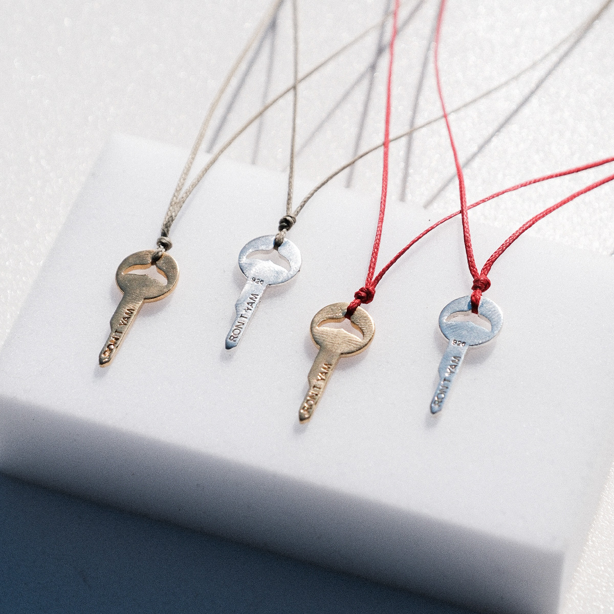 Whale key strand necklace