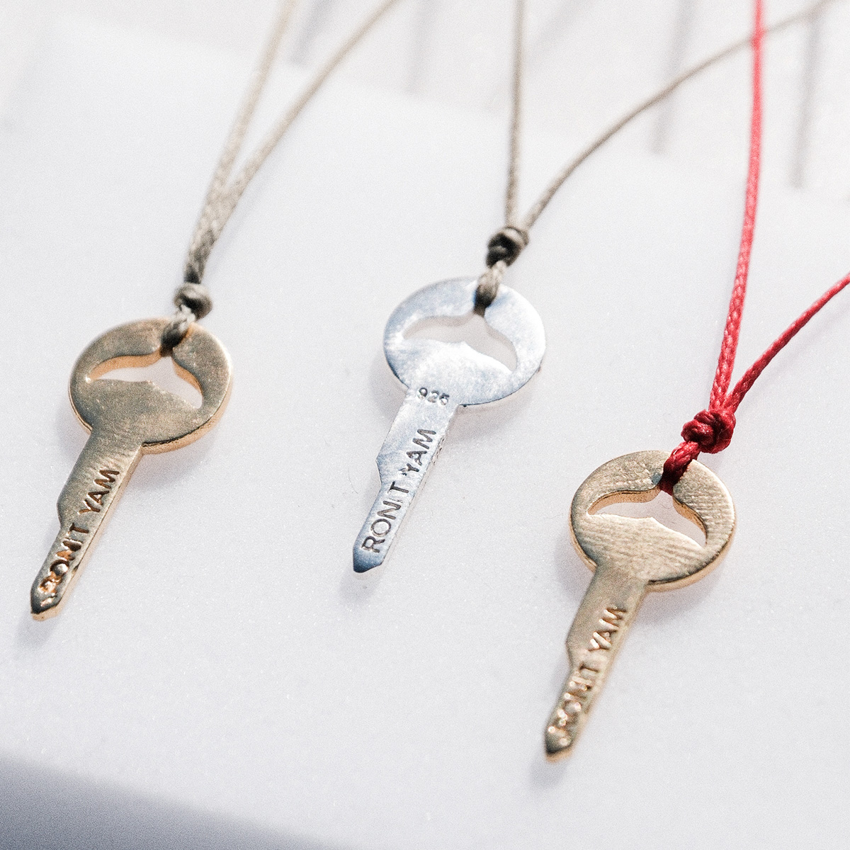 Whale key strand necklace