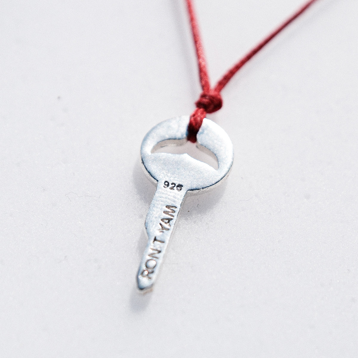 Whale key strand necklace