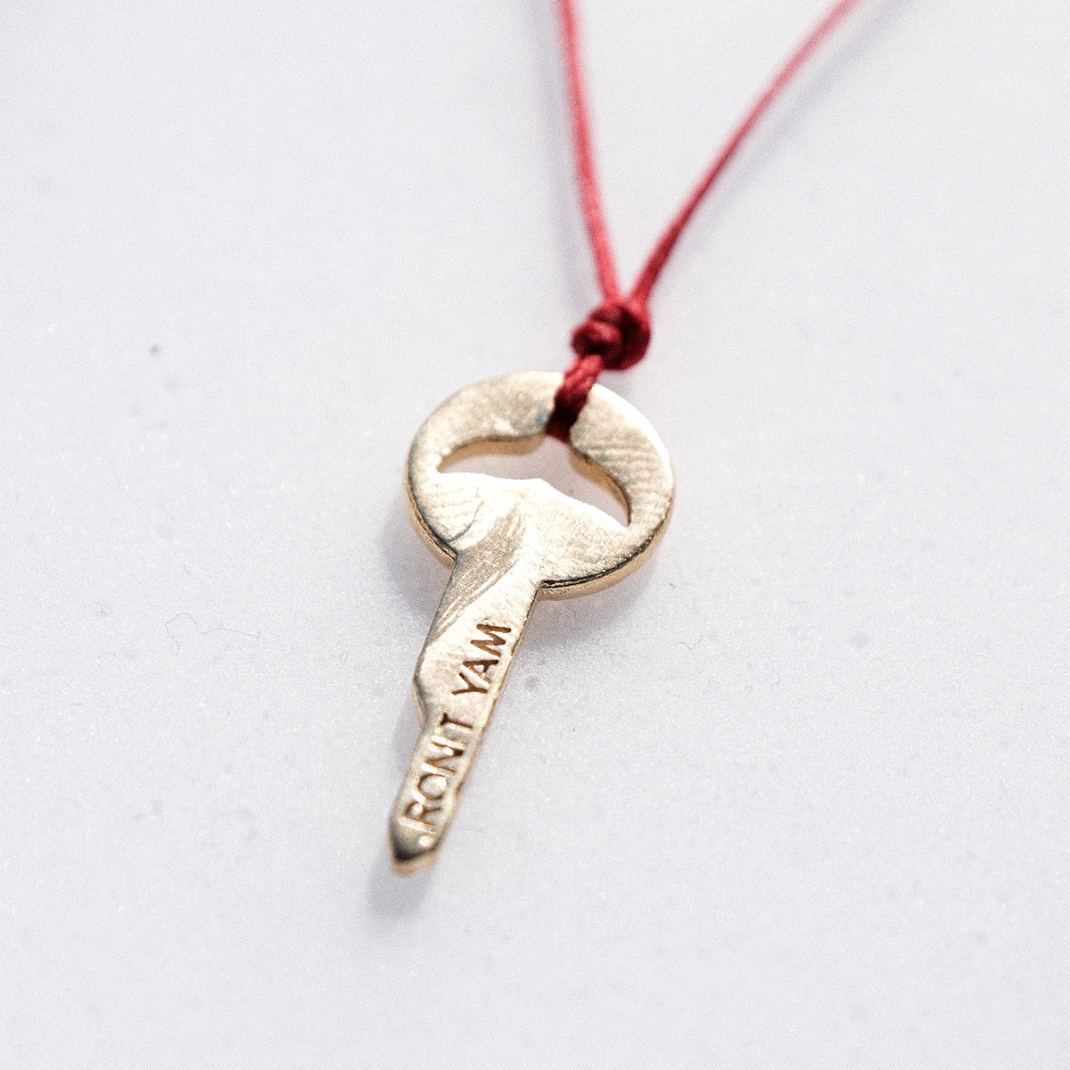 Whale key strand necklace