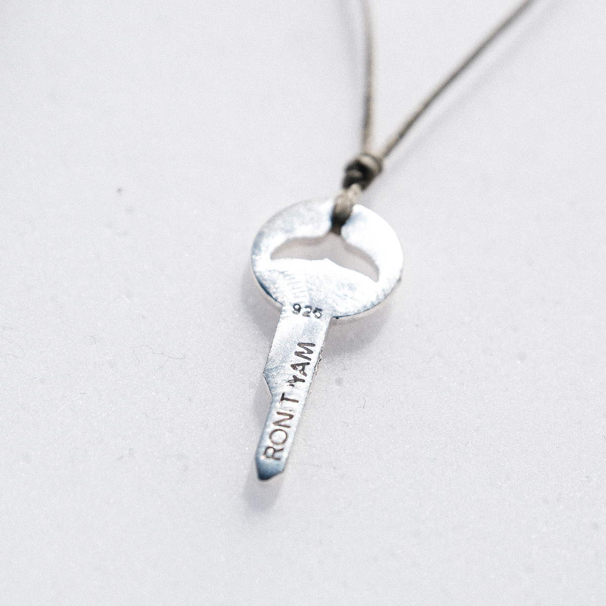 Whale key strand necklace